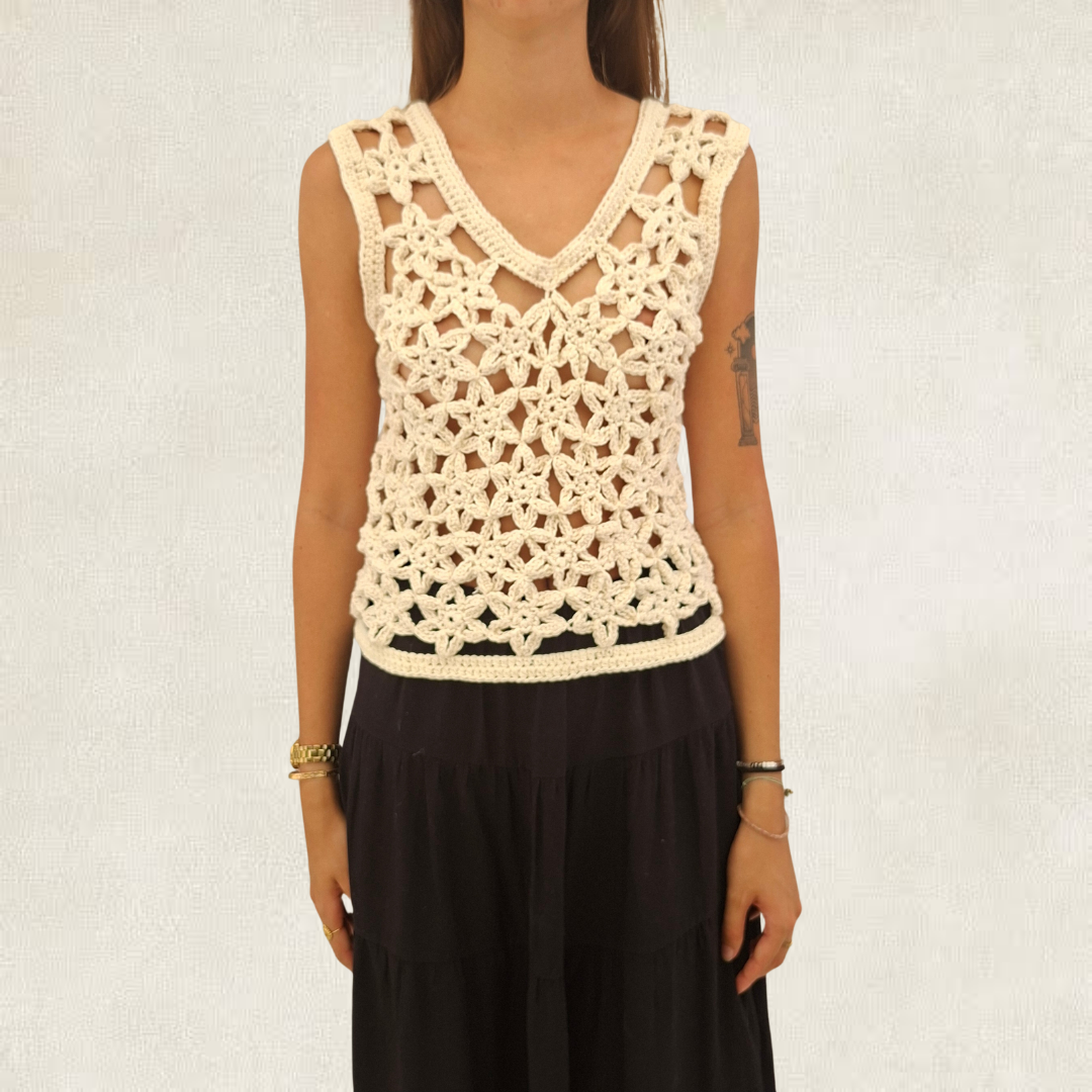 Top white crochet flowers