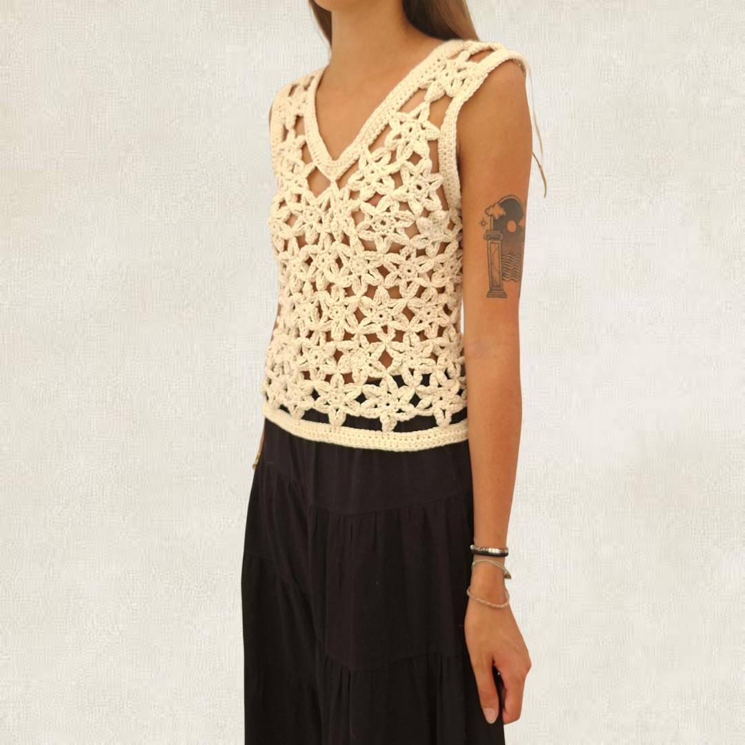 Top white crochet flowers