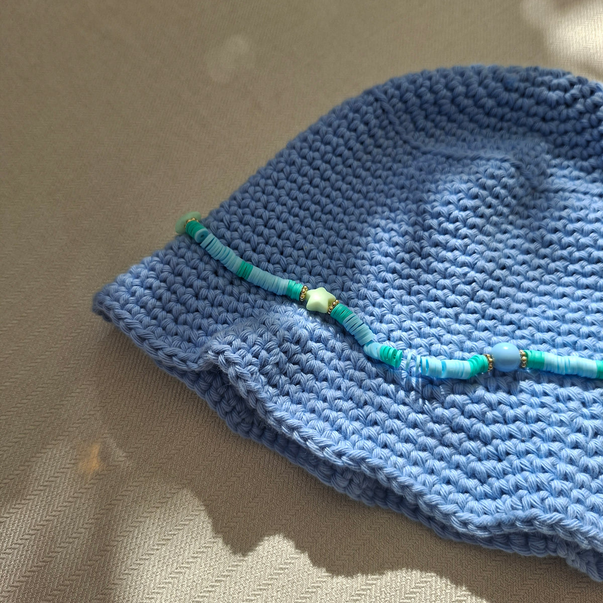 Blue beanie & pearls