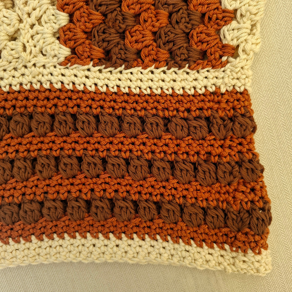 Brown crocheted low-cut top