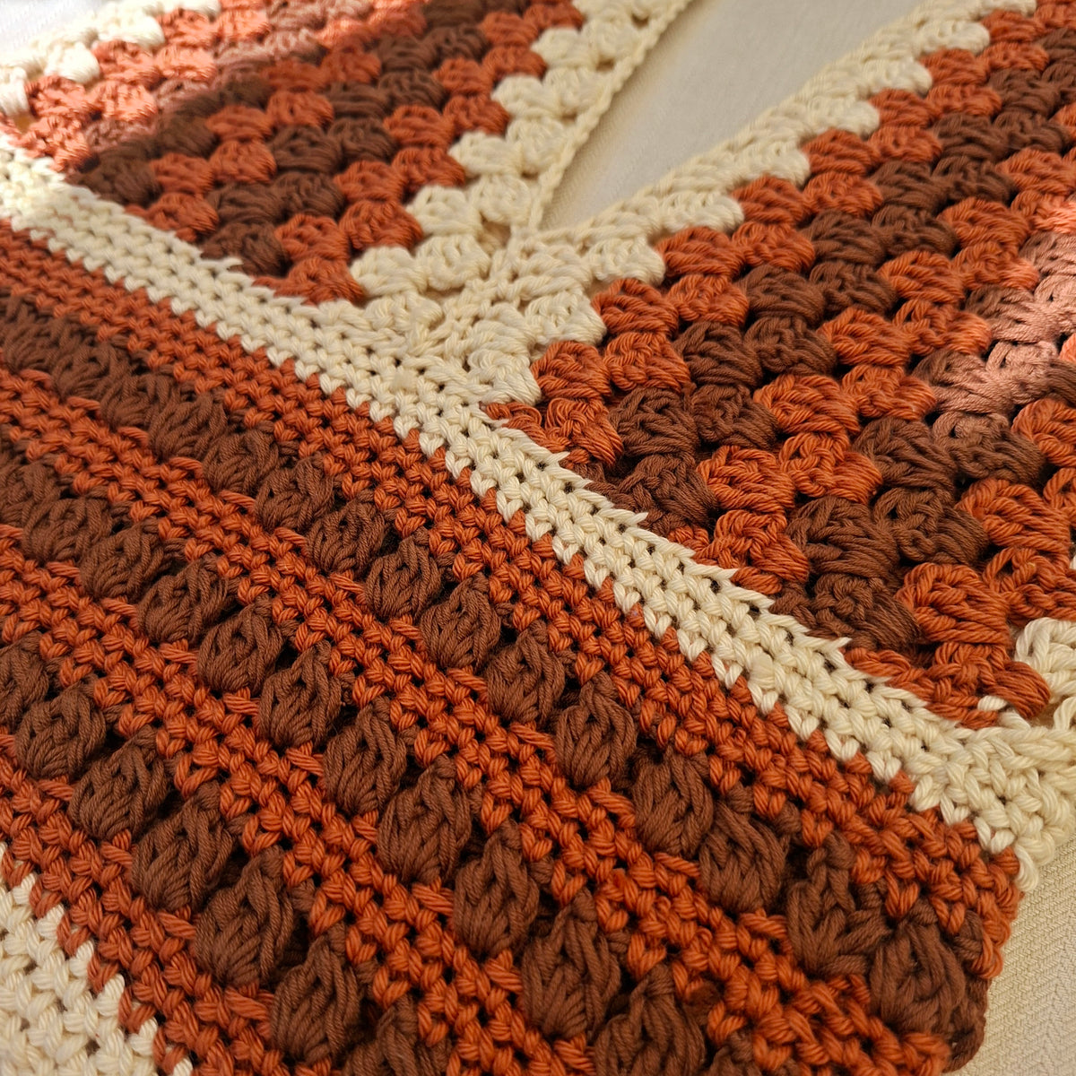 Brown crocheted low-cut top