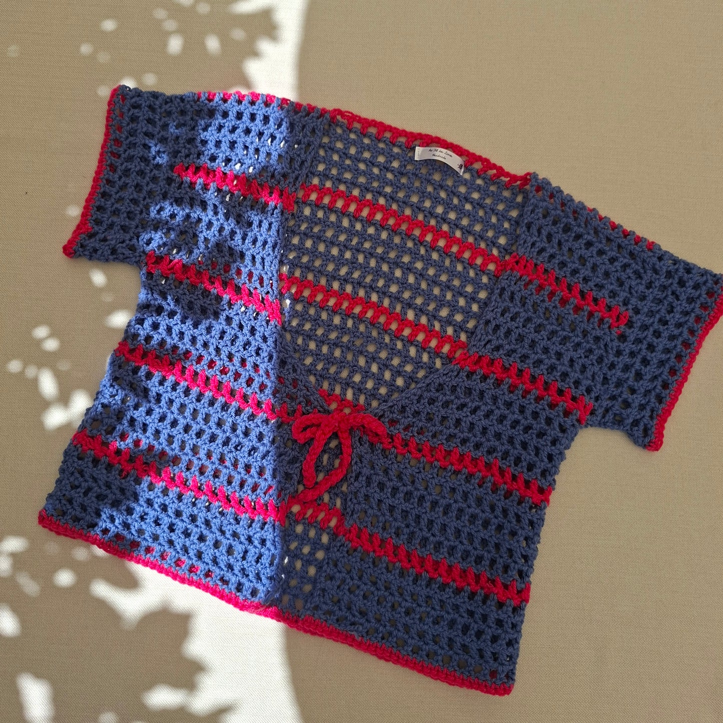 Cardigan rayé en crochet