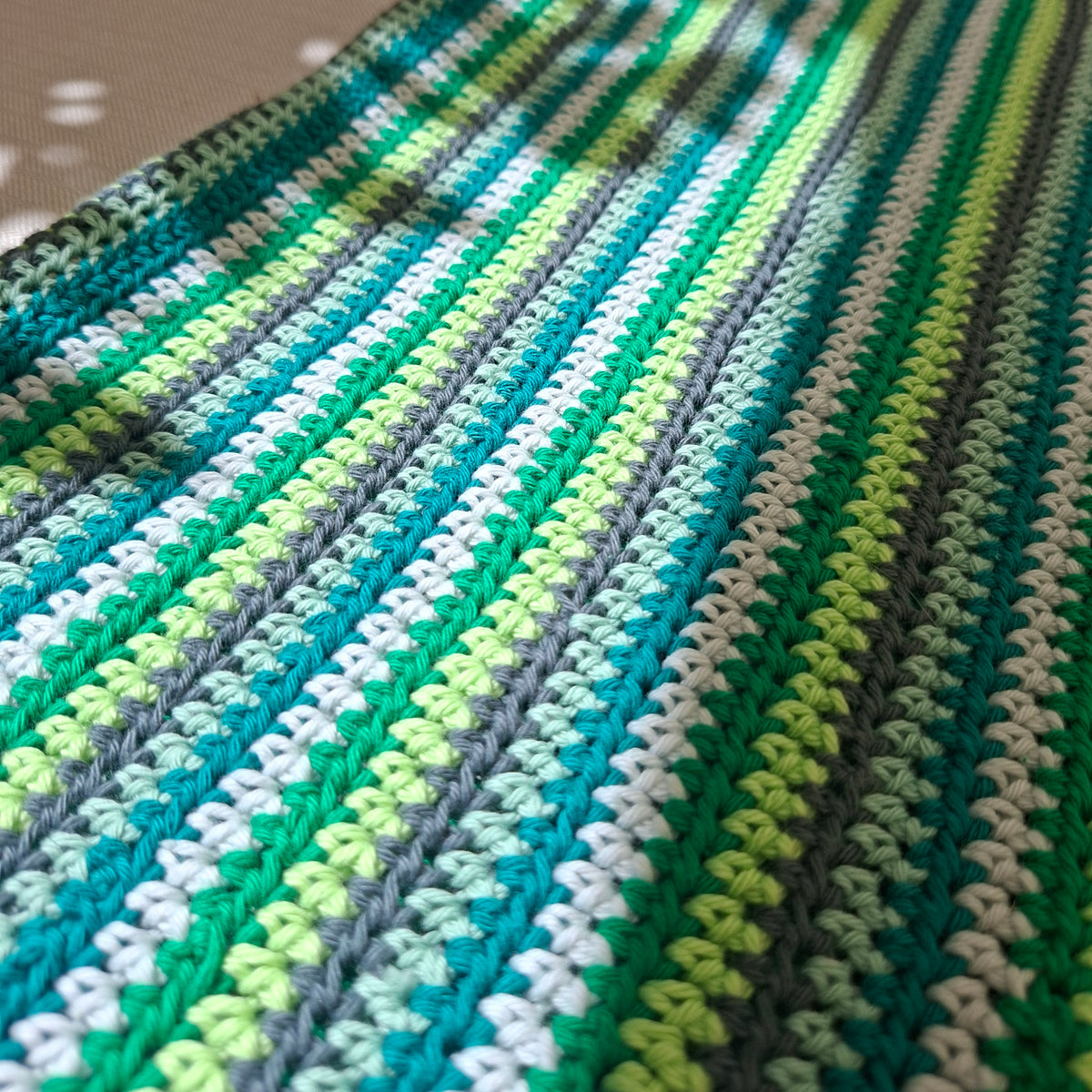 Green striped crochet dress