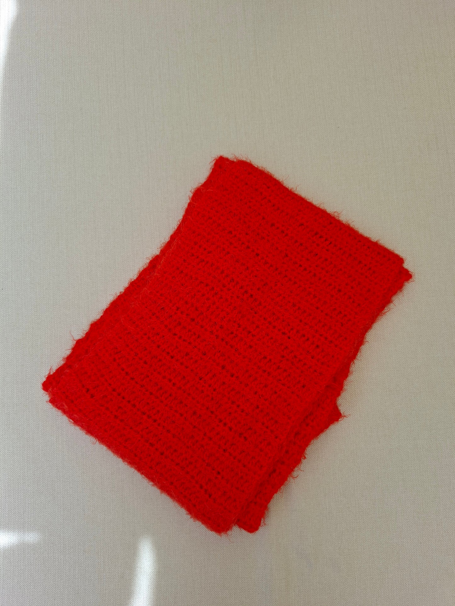 Orange crochet scarf