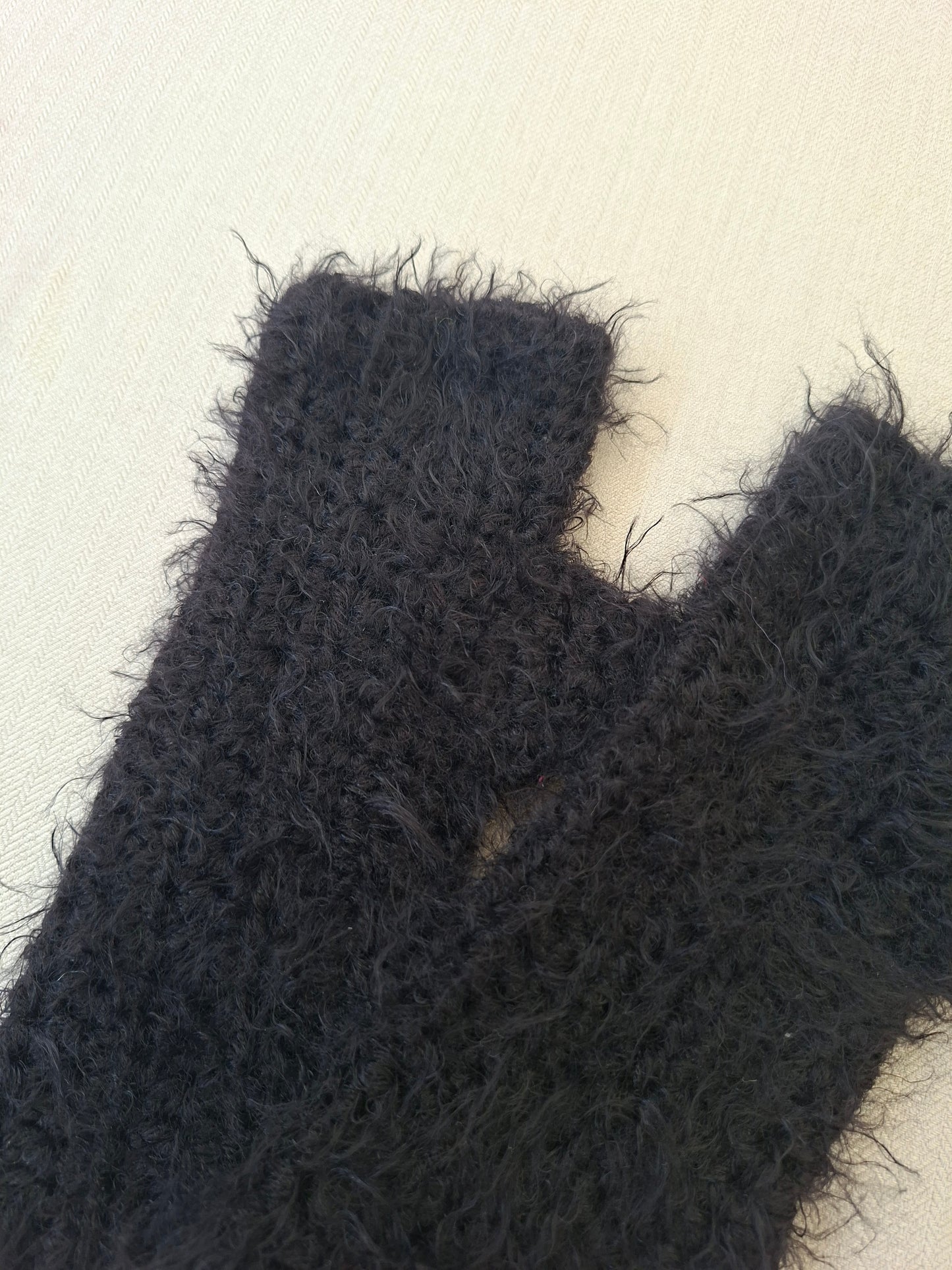 Black crocheted fingerless gloves