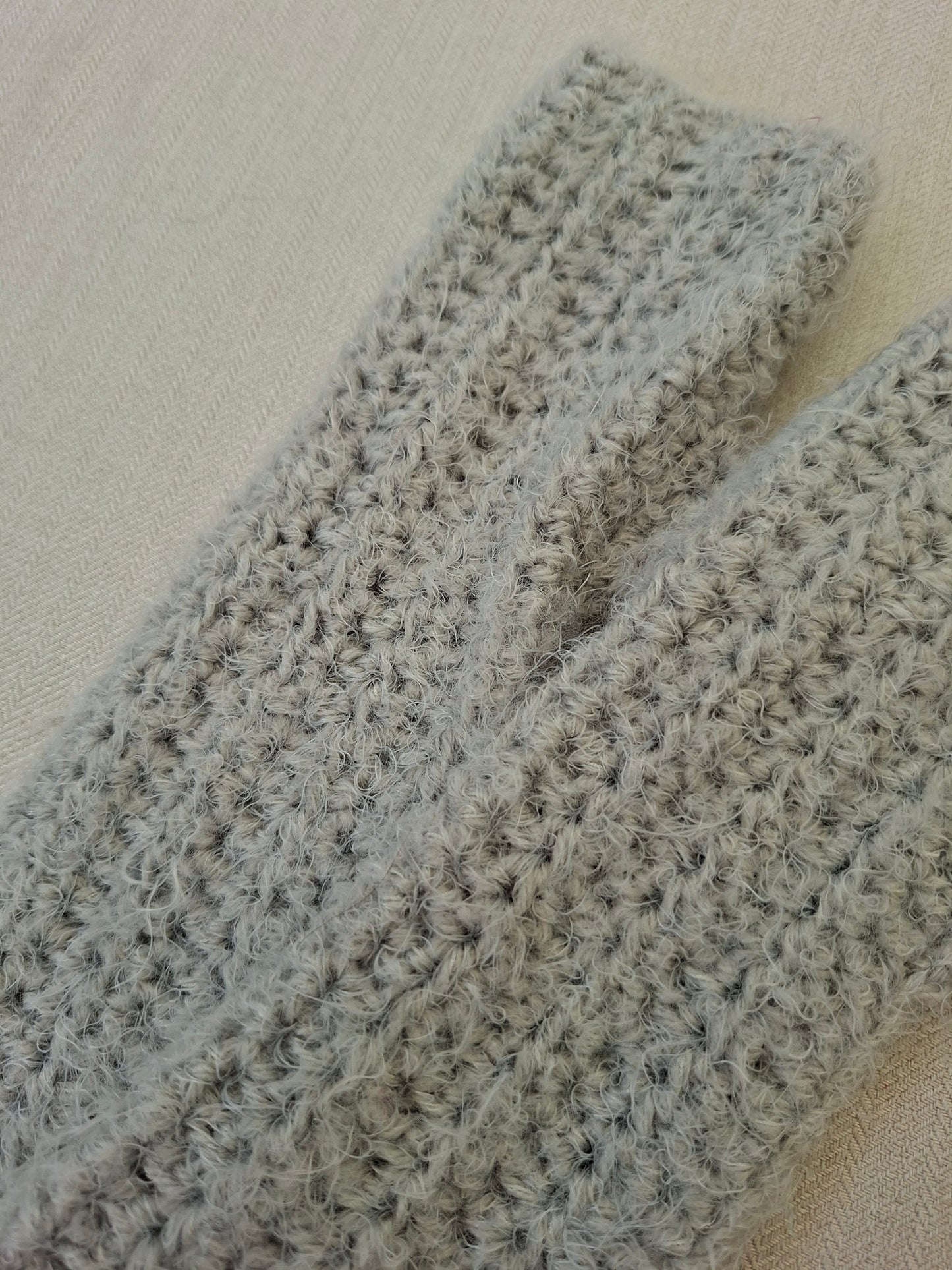 Grey crocheted mittens