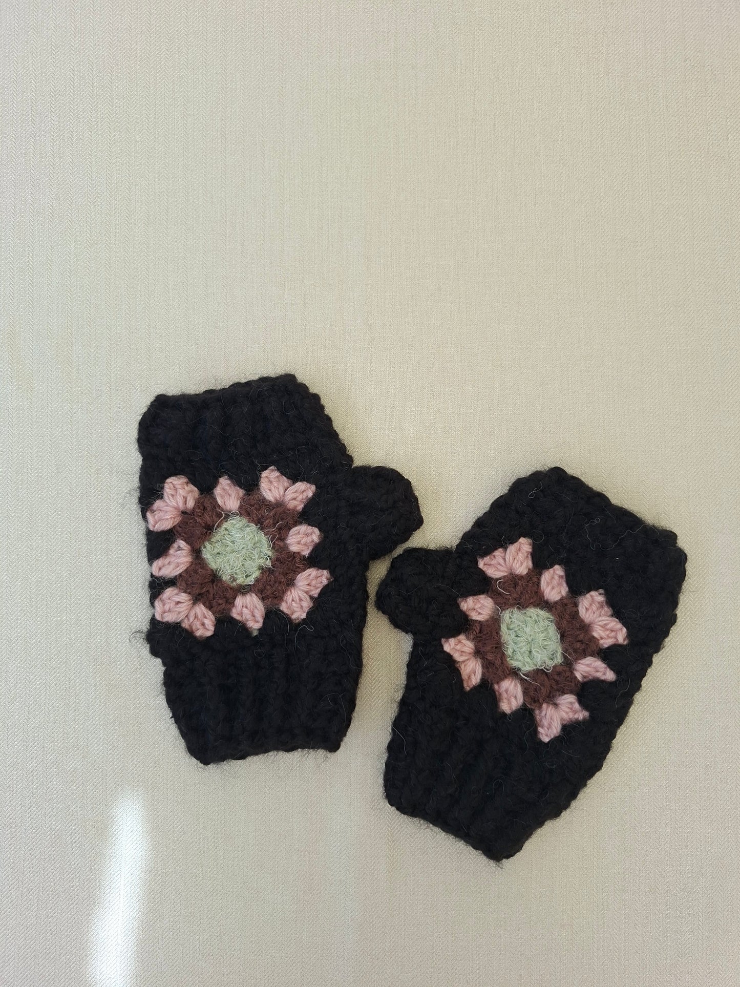 Multicoloured granny square crochet mittens