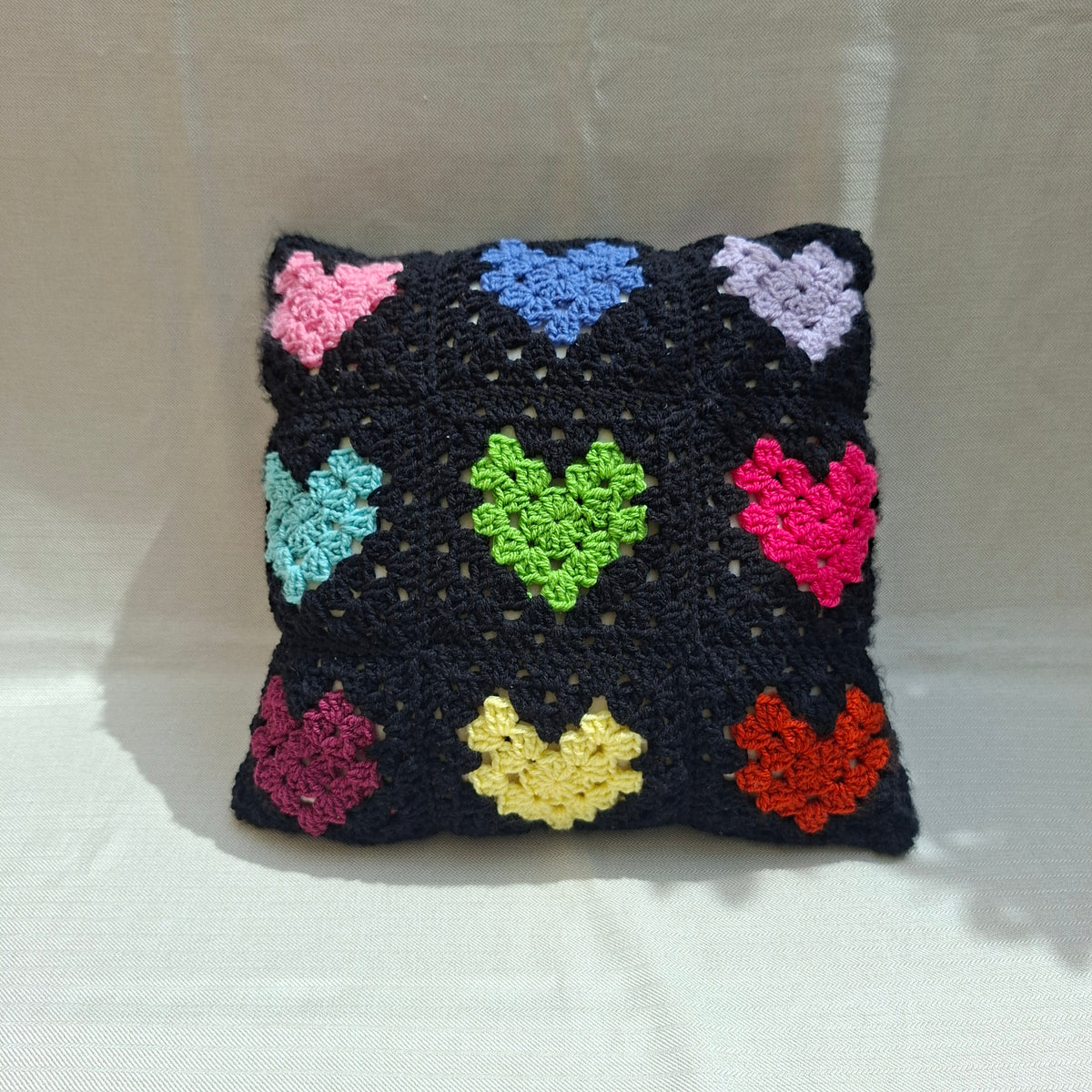Crochet heart pillow