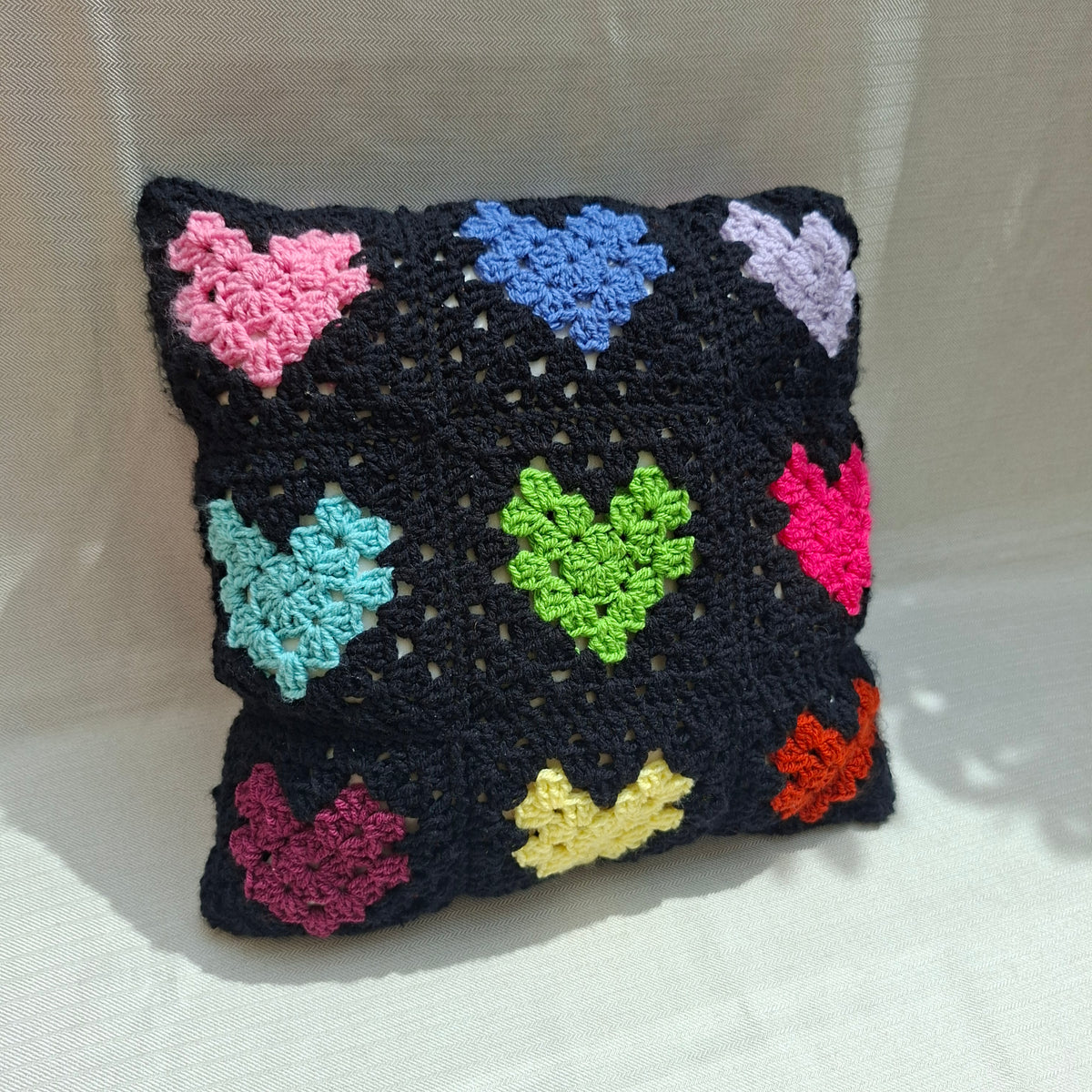 Crochet heart pillow