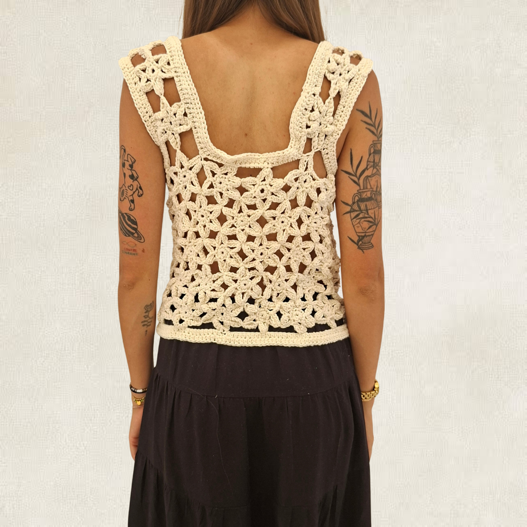 Top white crochet flowers