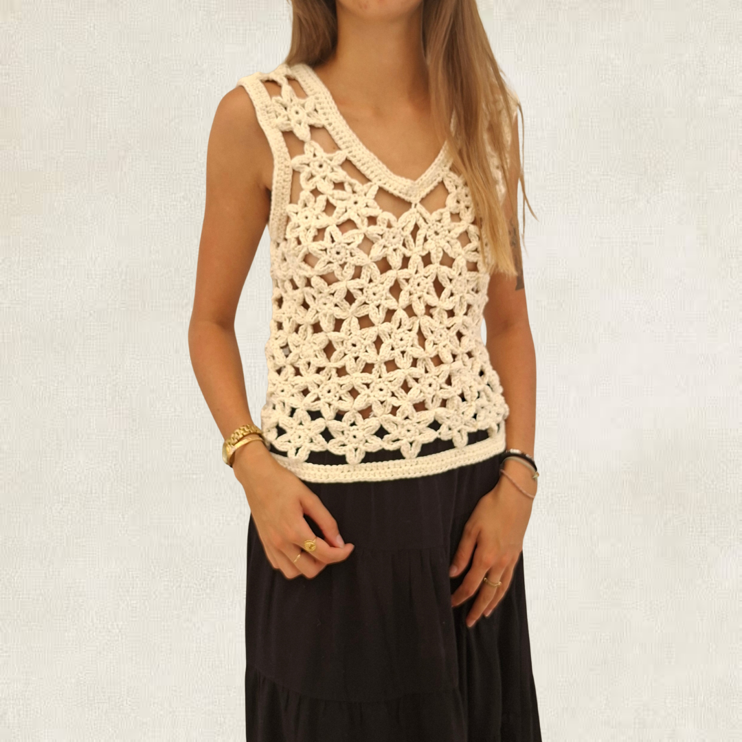 Top white crochet flowers